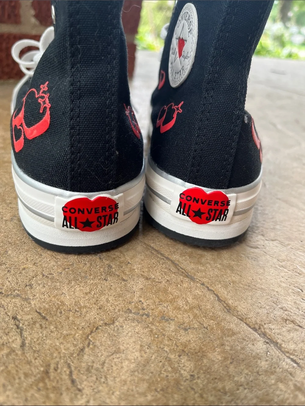 Converse Kids Black High-Top Sneakers with White Soles and Red Heart Details